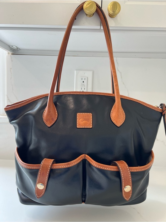 Dooney & Bourke Handbags - Dooney & Bourke Black & Tan Smooth Leather Crescent Tote Bag